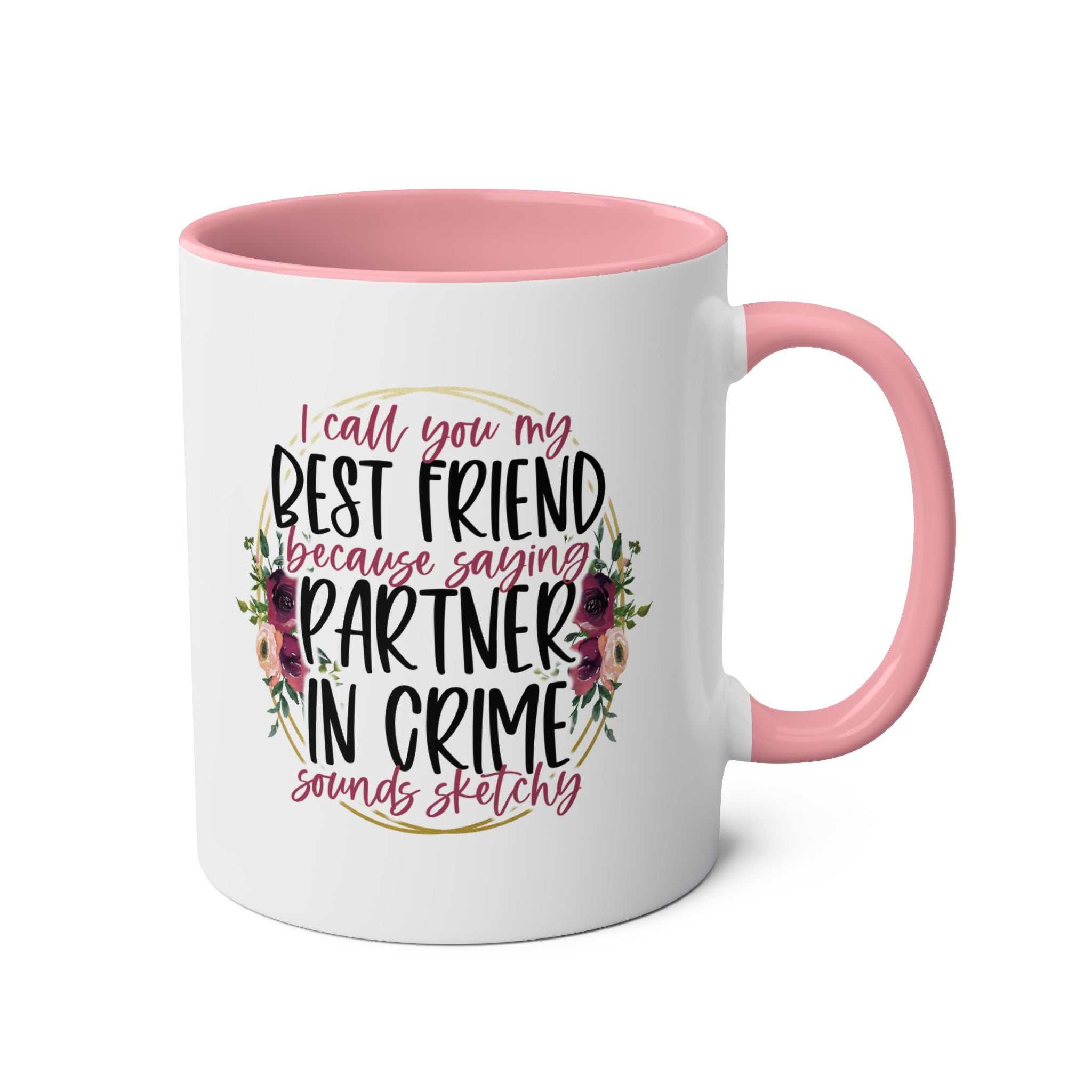 Partner in Crime Coffee Mug with humorous text and floral design, pink handle and interior, 11oz ceramic, microwave and dishwasher safe.