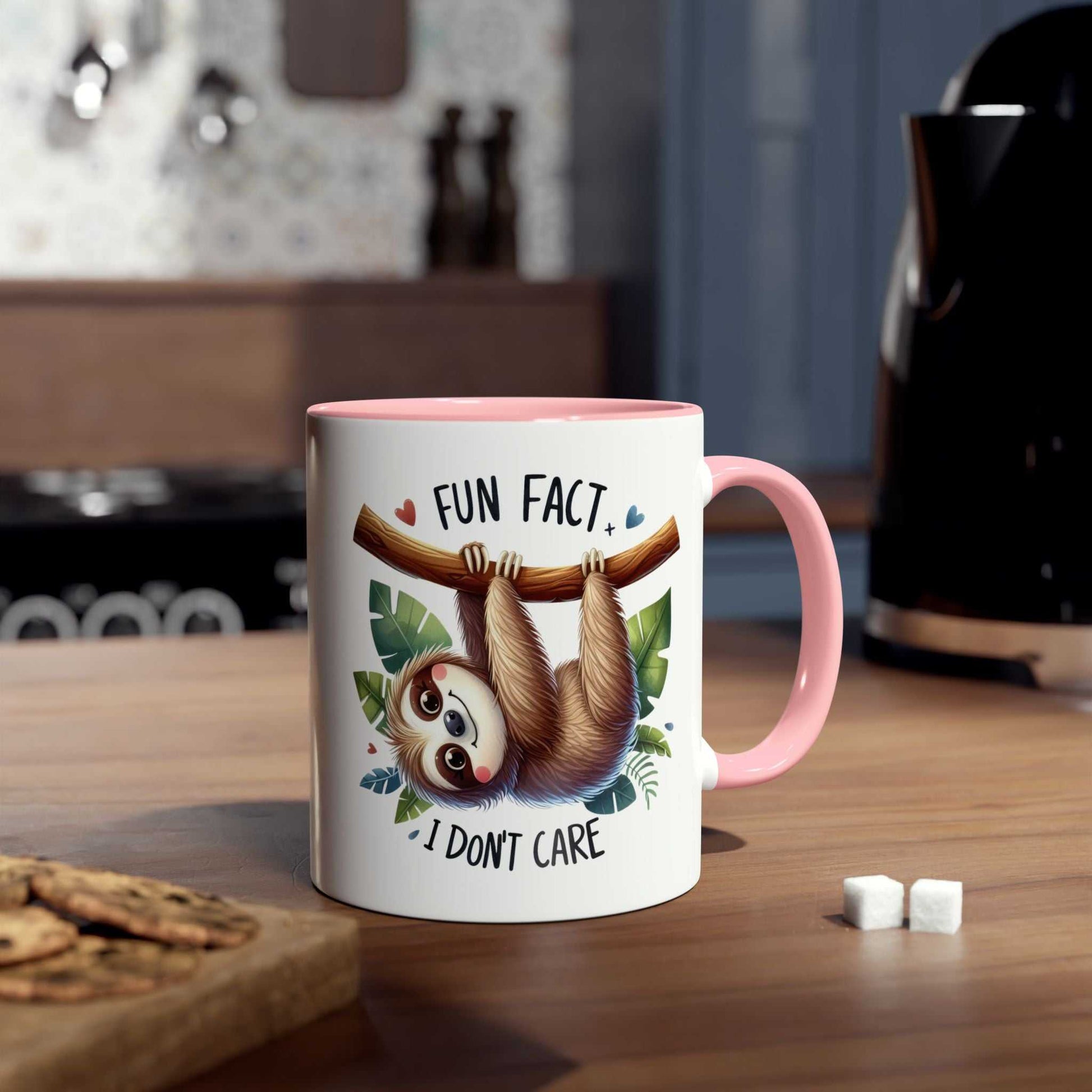 Cute sloth coffee mug with whimsical design on kitchen counter.