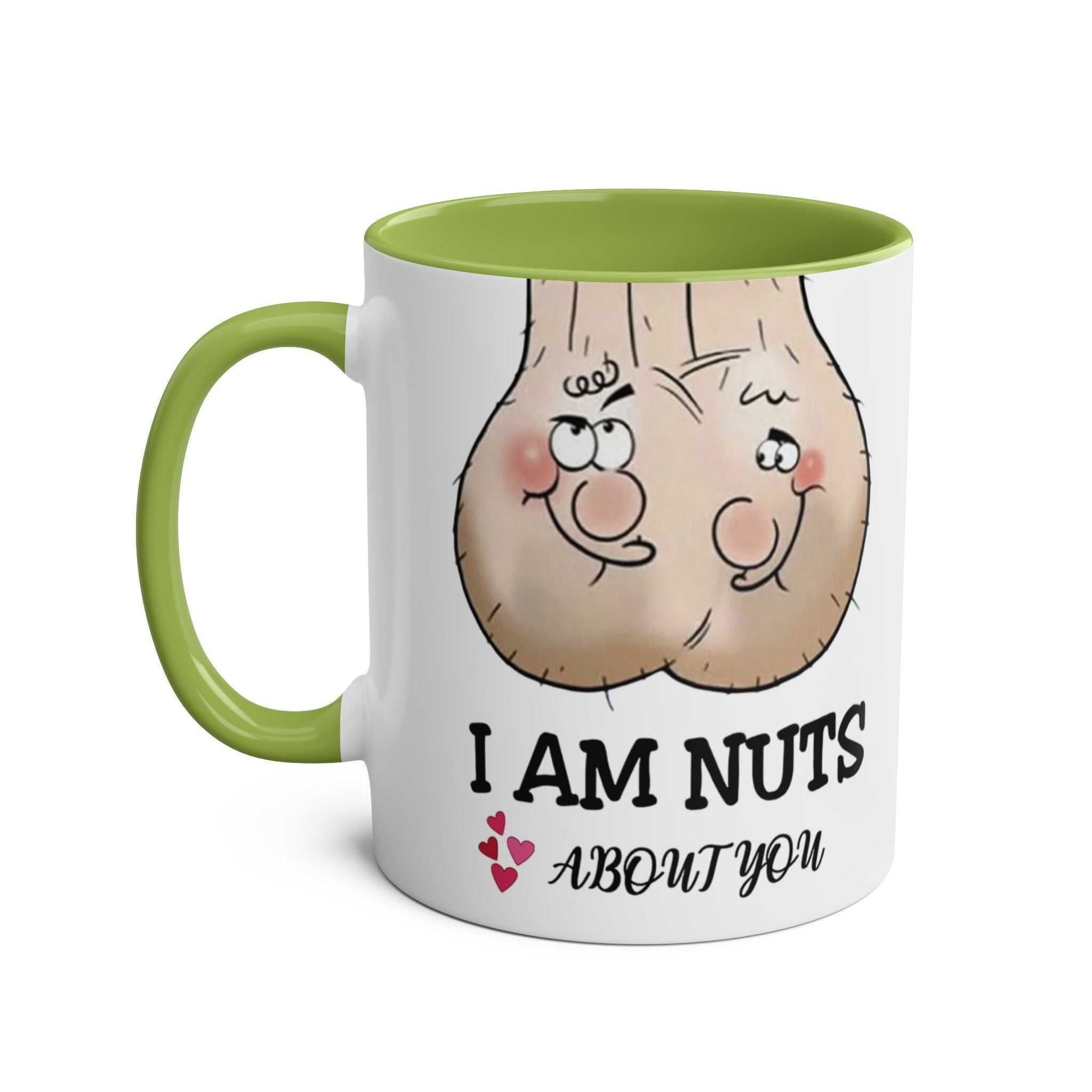 Cheeky "I Am Nuts About You" 11oz ceramic mug with green handle and interior.