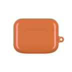 Bold orange protective hard shell case for AirPods and AirPods Pro with glossy finish and wireless charging compatibility