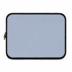 Misty blue neoprene laptop sleeve with black trim and dual zipper, lightweight, waterproof, and cushioned for protection.