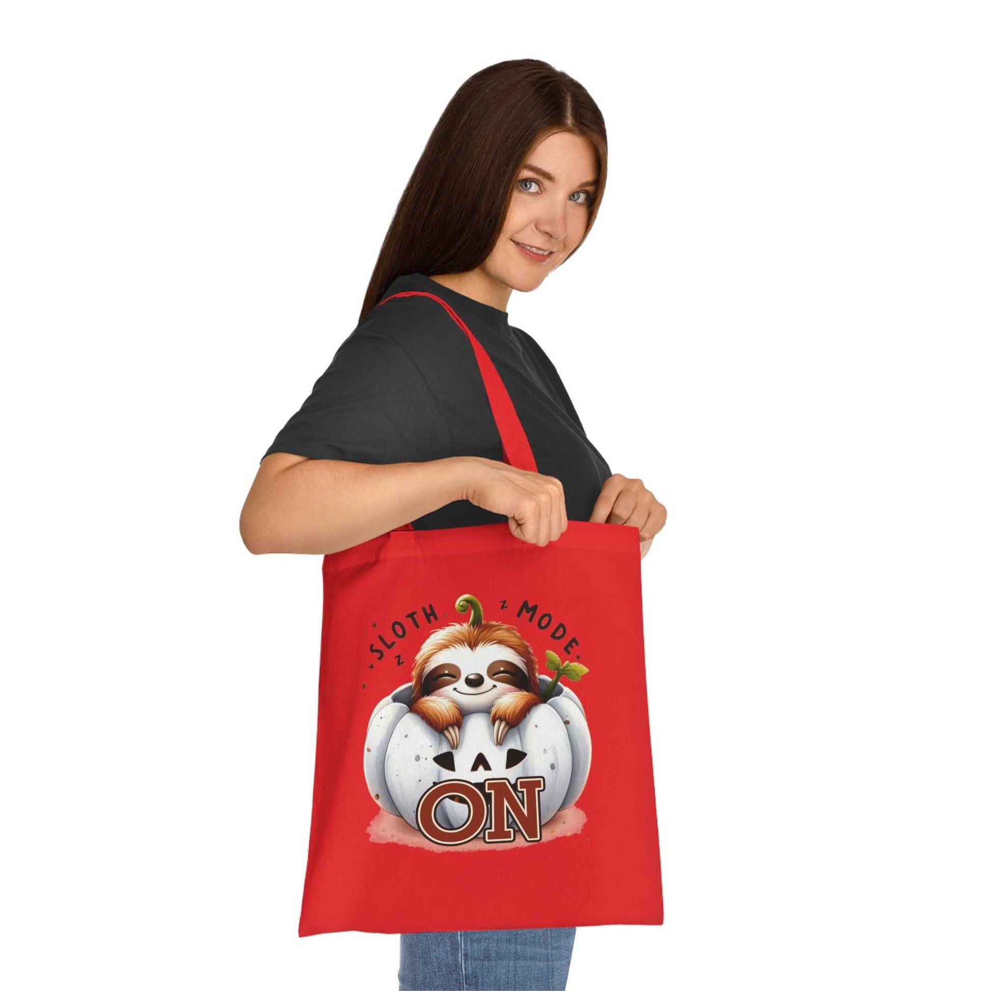 Cotton tote bag with cute sloth design, vibrant colors, 100% cotton fabric.