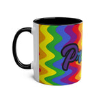 LGBTQ+ Pride mug with vibrant rainbow design and black handle.