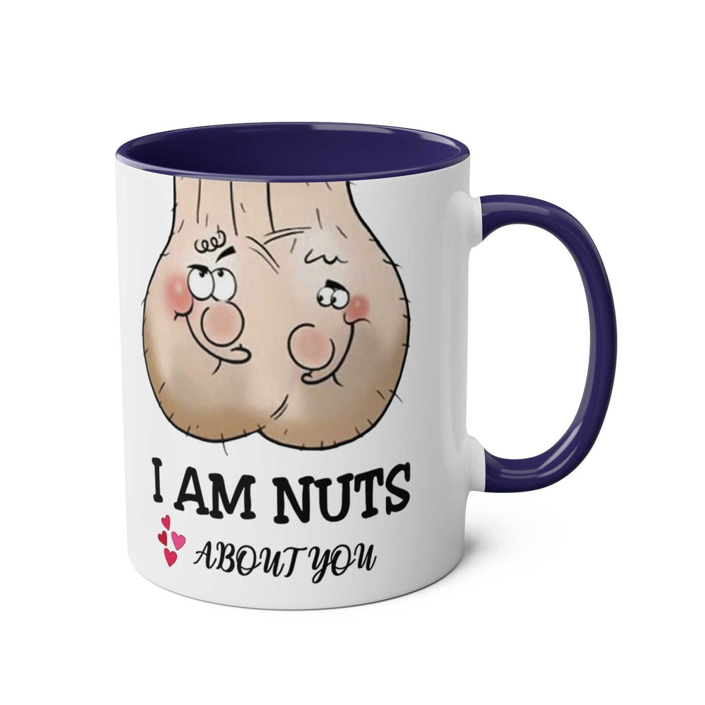 11oz white ceramic mug with blue handle and rim featuring cheeky cartoon nuts and "I Am Nuts About You" text design