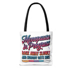 Menopause in Progress tote bag with cheeky design, durable spun polyester, multiple sizes and handle colors