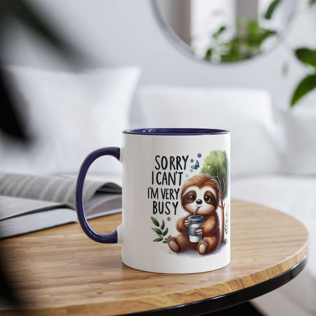 Cute sloth coffee mug with whimsical design on a wooden table.