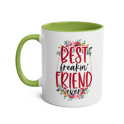 Best Freaking Friend Coffee Mug with floral design, green handle, and interior.