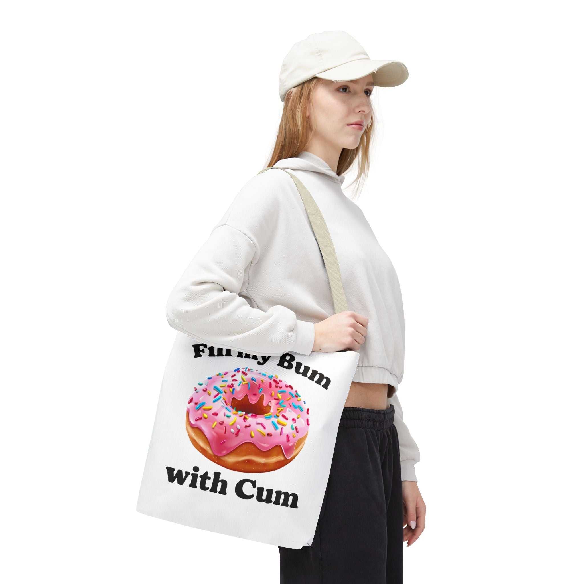Provocative Donut Tote Bag with cheeky donut print, durable spun polyester, multiple sizes and handle colors for fun, everyday use