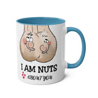 White ceramic 11oz mug with blue handle and rim featuring cheeky "I Am Nuts About You" design for fun gift