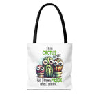 Fun cactus tote bag with cheeky design and colorful handles, made from durable spun polyester, ideal for daily use.