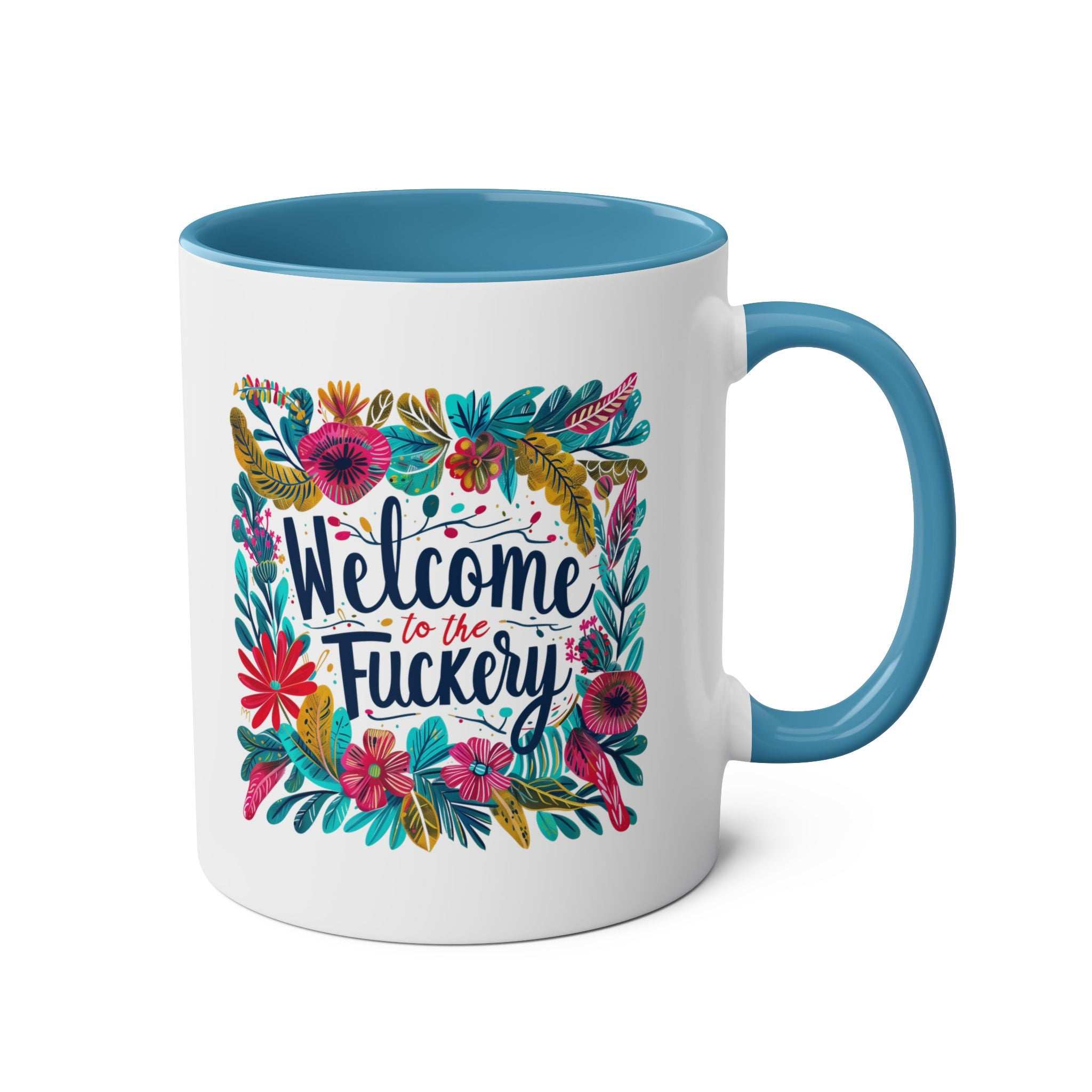 Colorful floral design "Welcome to the Fuckery" coffee mug with blue interior and handle.