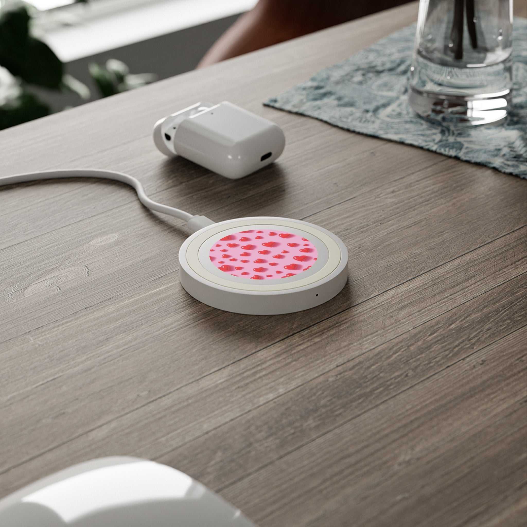 Pink Hearts Design wireless charging pad with 5W power and compact 7cm diameter on wooden desk
