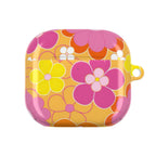 Retro floral patterned hard shell AirPods protective case in bright yellow, pink, and orange colors