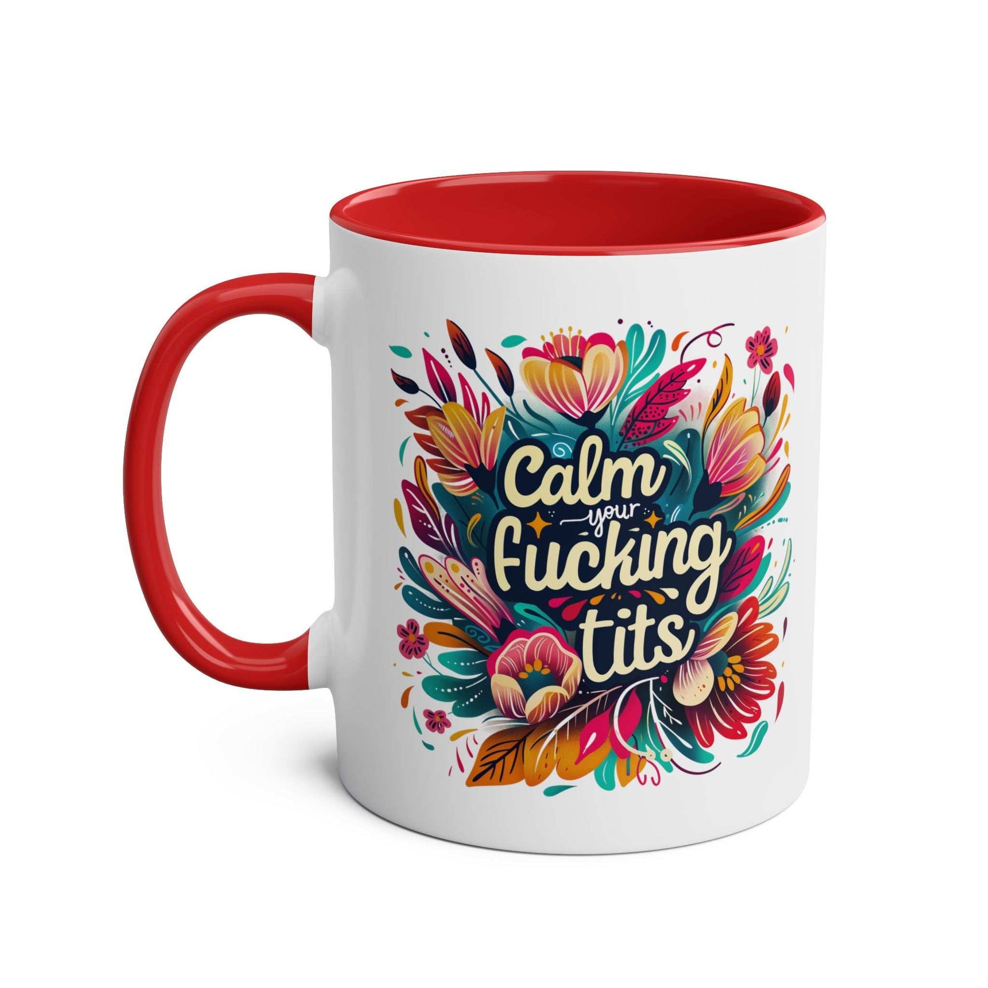 Colorful "Calm Your Tits" coffee mug with floral design and red handle.