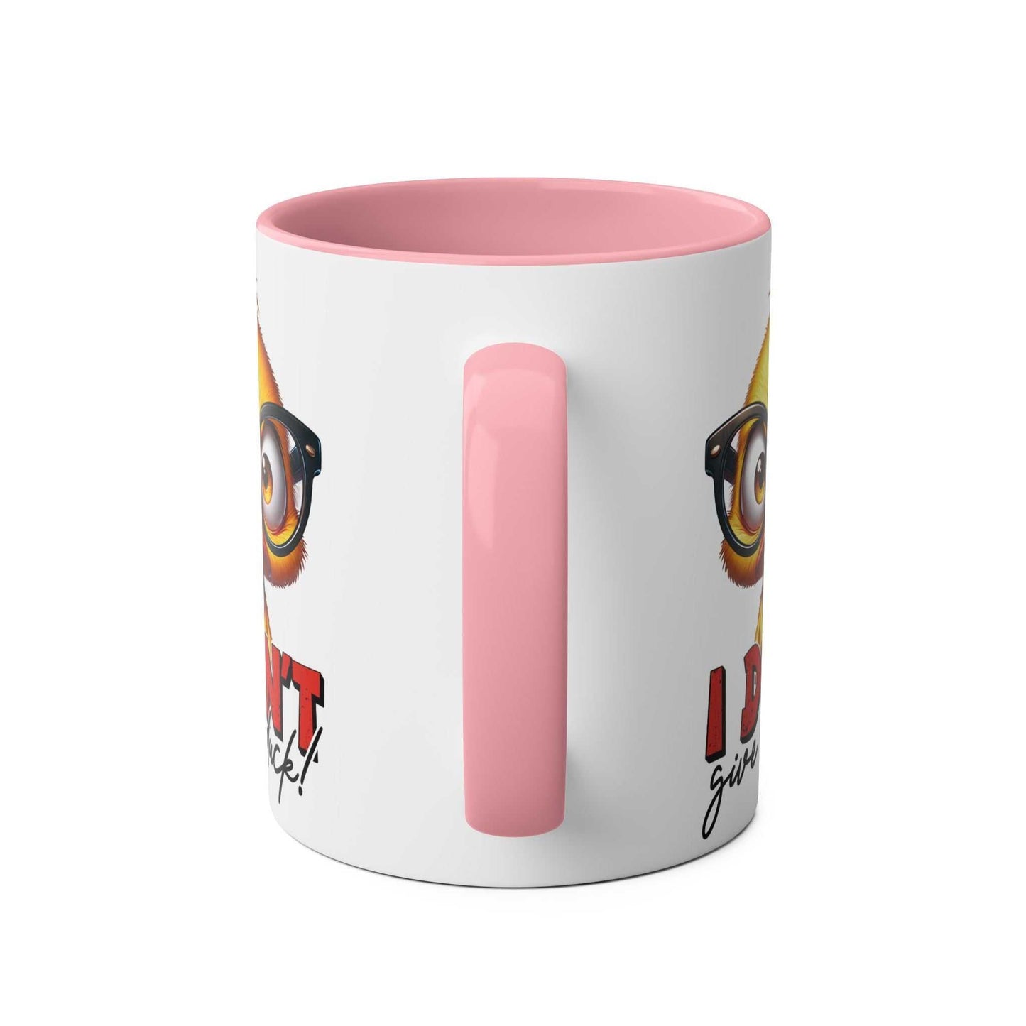 Playful duck design coffee mug with pink handle, "I Dont Give A Duck", glossy finish.