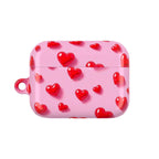 Pink Hearts AirPods protective hard shell case with vibrant red hearts design and glossy finish