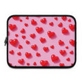 Pink heart laptop sleeve made of durable neoprene with soft foam lining and dual zipper closure.