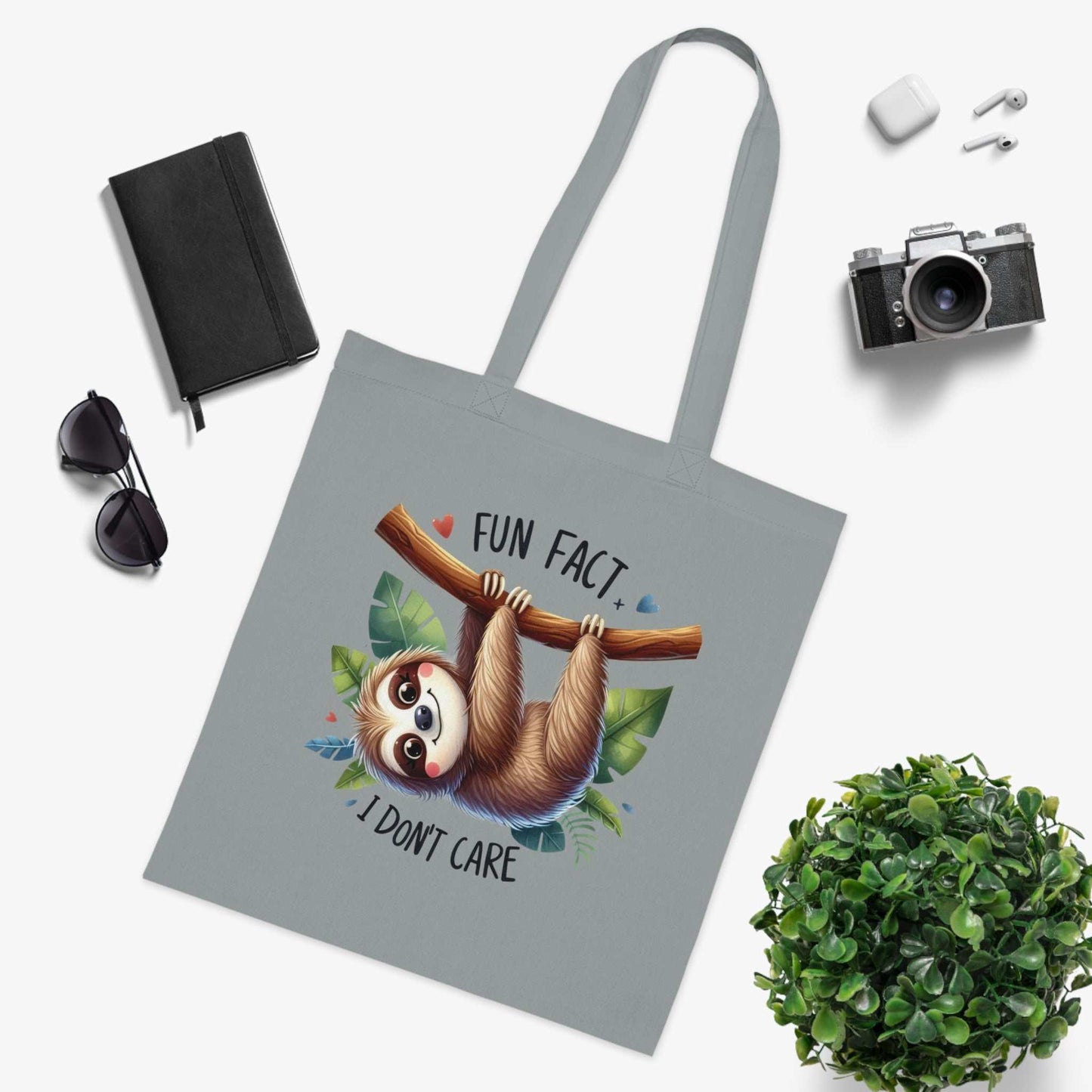 Cute sloth tote bag in gray with "Fun Fact I Don't Care" design, ideal for sloth lovers.