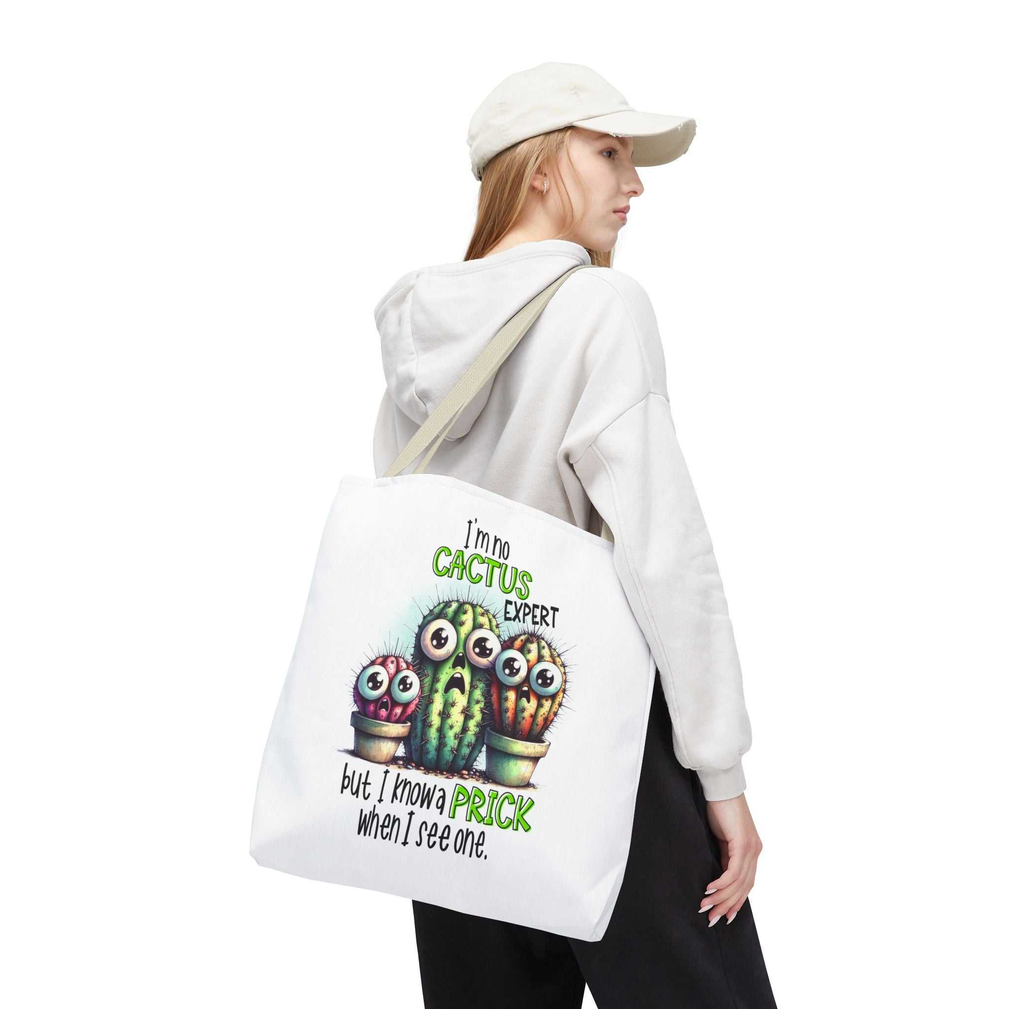 Fun cactus tote bag with cheeky design, durable spun polyester, multiple sizes and handle colors.