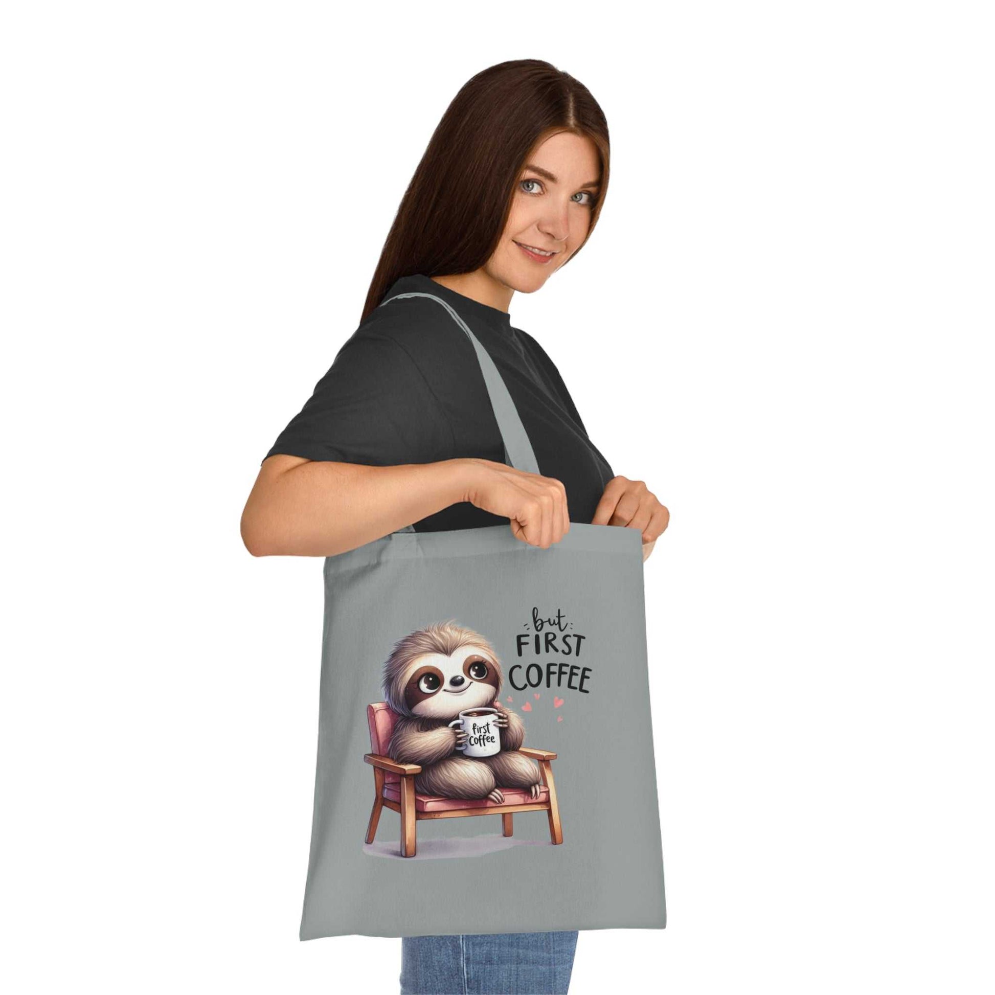 Cotton tote bag with cute sloth design, perfect for essentials, in vibrant colors.