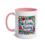 Fuckery Coffee Mug with floral design and pink handle.