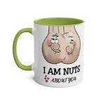 I Am Nuts About You mug with cheeky nut cartoon design, 11oz ceramic, green handle and interior, dishwasher safe