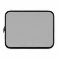 Silver laptop sleeve made of durable neoprene with soft foam lining and dual zipper closure