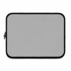 Silver laptop sleeve with black trim, neoprene material, and dual zipper closure