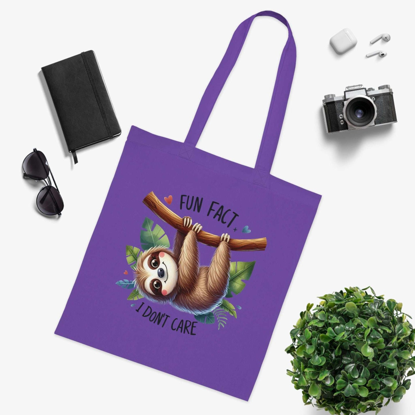 Cute sloth cotton tote bag with whimsical design, ideal for everyday use and gifting.