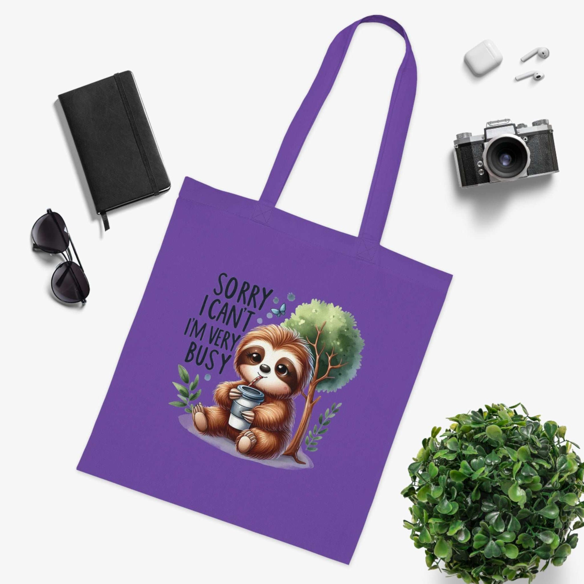 Cotton tote bag with cute sloth design, vibrant colors, and durable 100% cotton fabric.