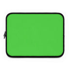 Lime green neoprene laptop sleeve with soft foam lining and dual zipper closure, lightweight and waterproof.