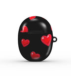 Black air pod case with red heart patterns on a white background