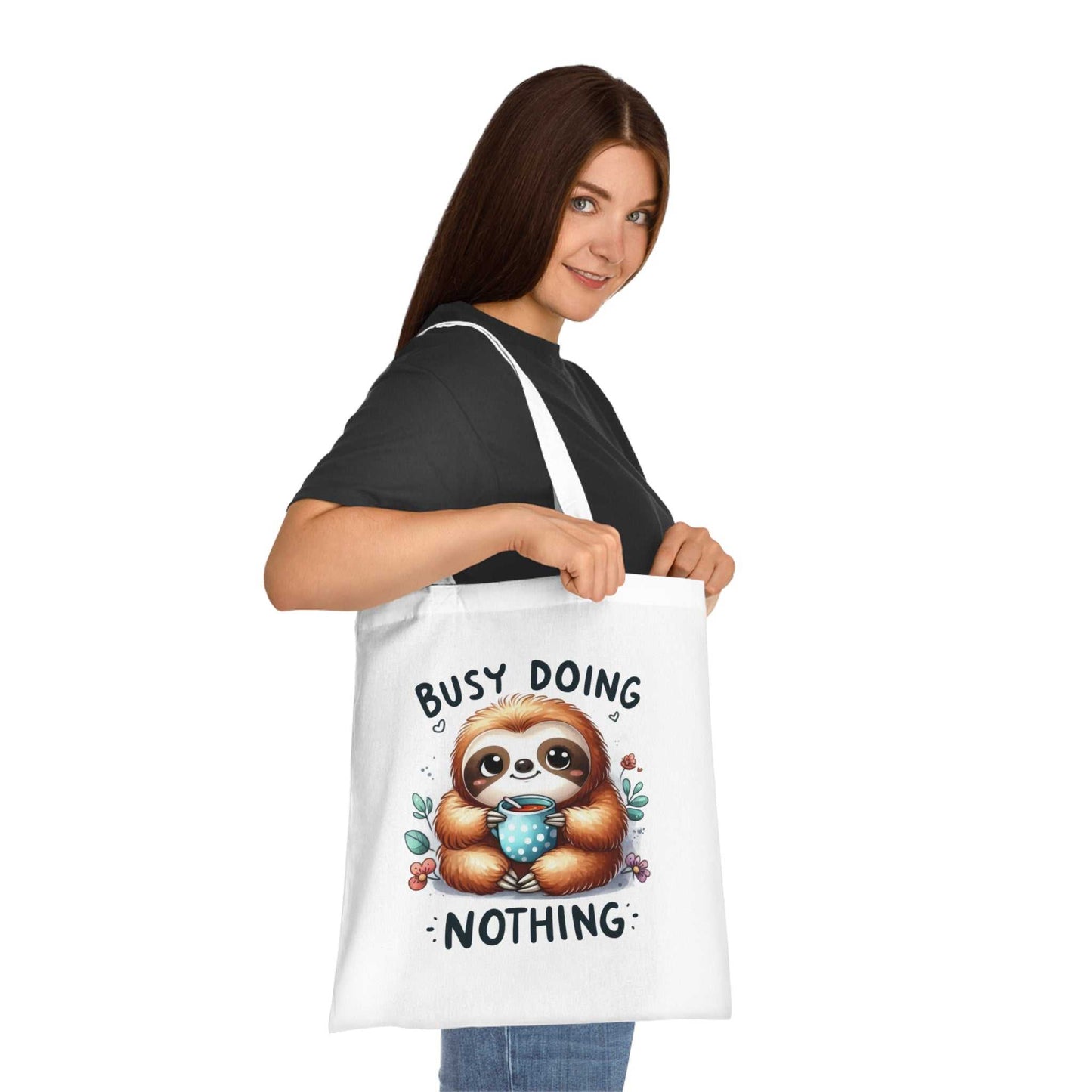 Cotton tote bag with cute sloth design, perfect for essentials, available in vibrant colors.