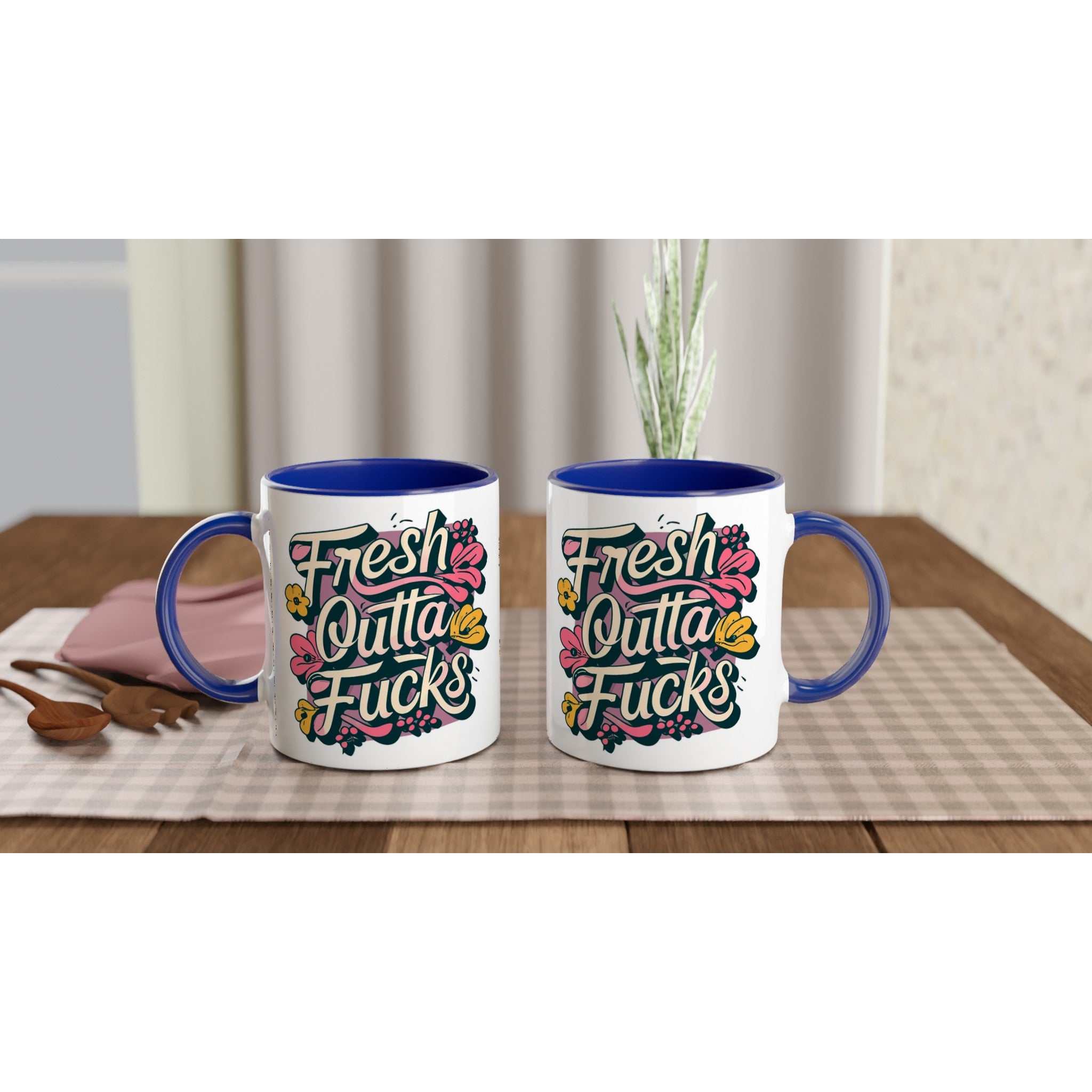 Fresh Outta Fucks Fun Mug on table with colorful design and blue handle