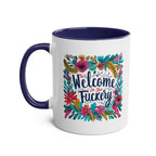 Colorful 'Welcome To The Fuckery' coffee mug with floral design, perfect for mischief-makers.