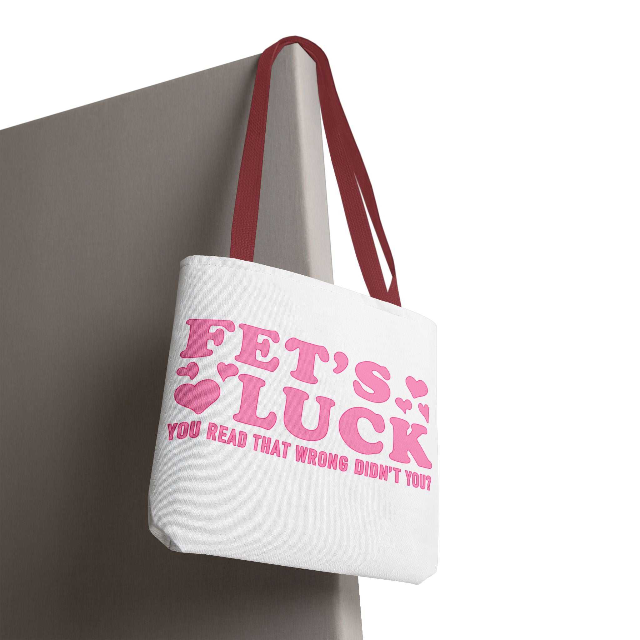 Pink heart tote bag with cheeky fun design and durable spun polyester material