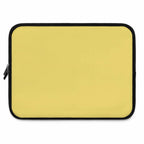 Lemon yellow neoprene laptop sleeve with black trim, soft foam lining, dual zipper, lightweight and waterproof design for 13 to 17 inch laptops.