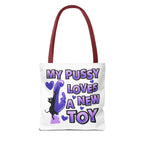 Fun cat toy tote bag with cheeky design, multiple sizes, colorful handles, and durable spun polyester material