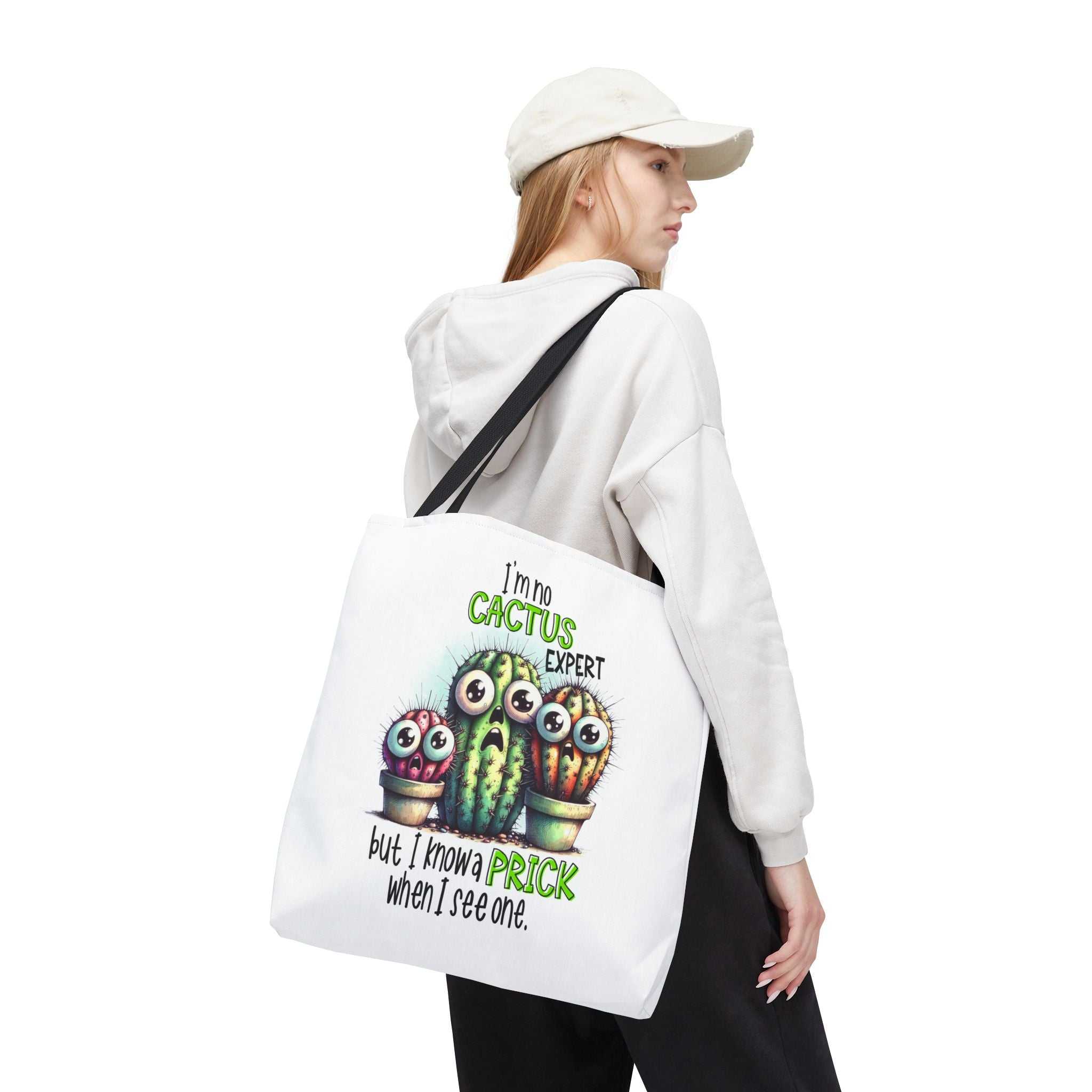 Fun cactus tote bag with cheeky printed design, multiple sizes, and colorful handles
