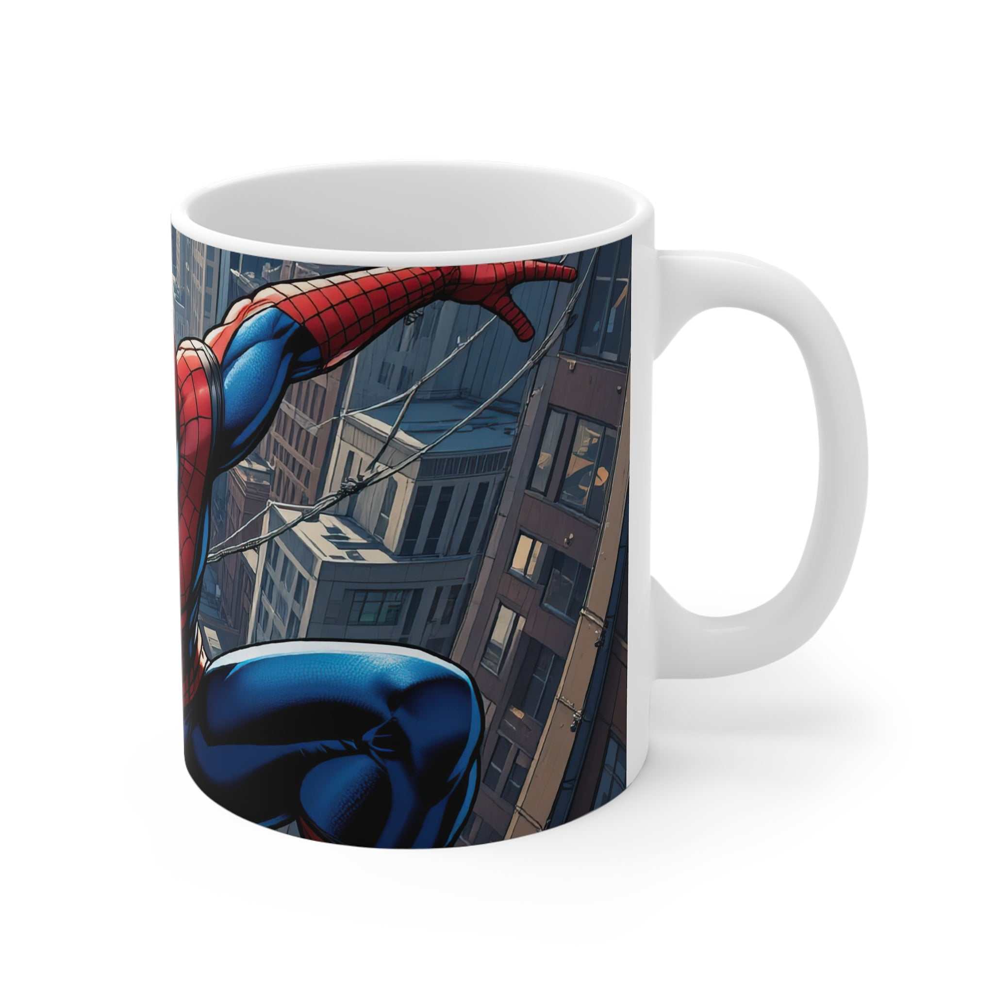 White ceramic mug featuring vibrant Spider-Man comic artwork swinging between city buildings, glossy finish, 11oz capacity, microwave and dishwasher safe.