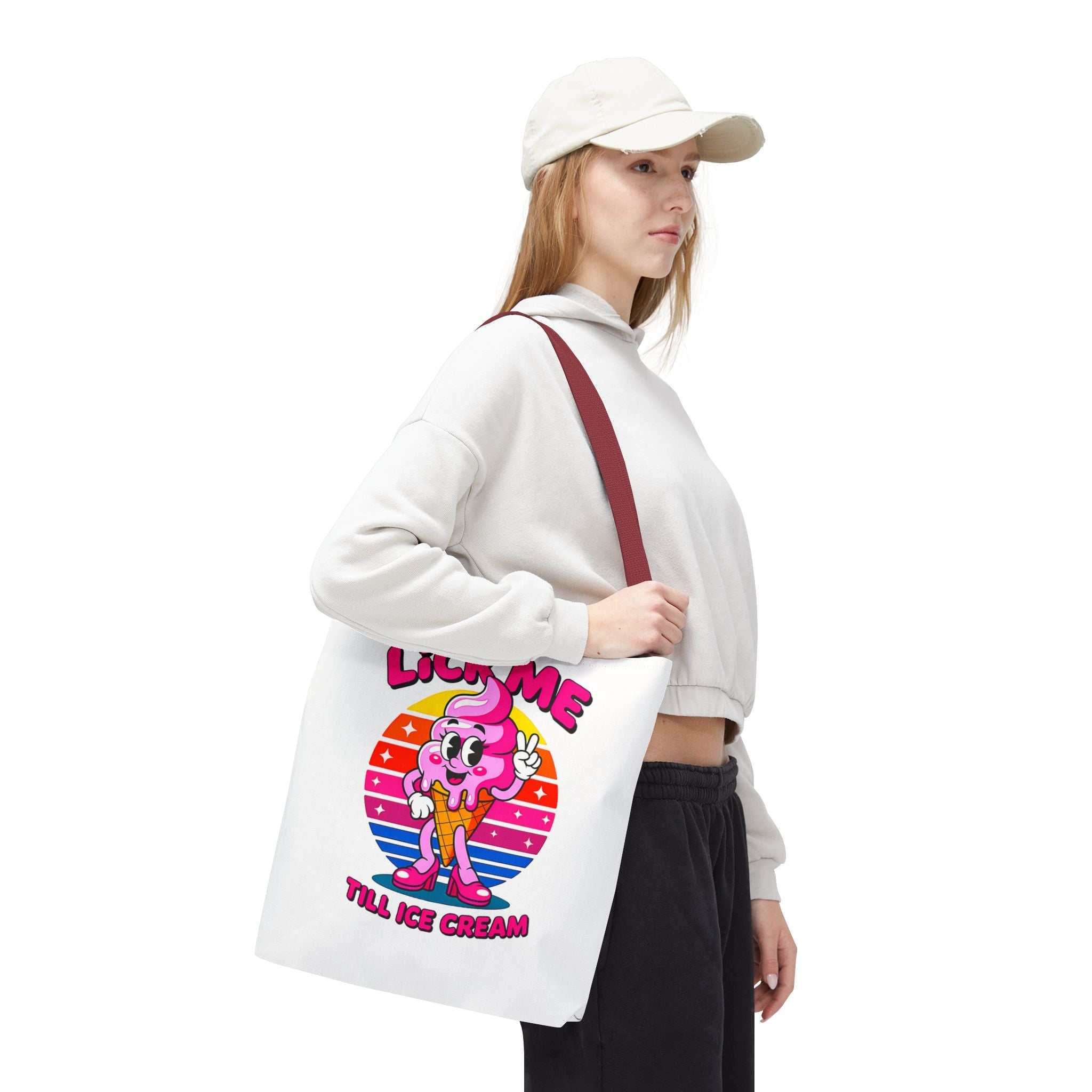 Cheeky Lick Me Till Ice Cream Tote Bag with colorful handles, durable polyester, and playful design