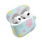 Pastel doggy paw print AirPods protective hard shell case in blue with pink, yellow, and green paw designs, compatible with AirPods and AirPods Pro.