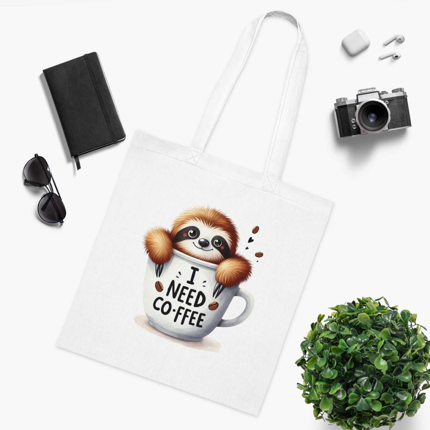 Cotton tote bag with cute sloth design, perfect for stylish everyday use.