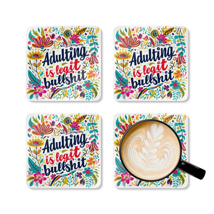 Colorful humorous coaster set with "Adulting Is Legit Bullshit" text, features floral design, cork backing, non-slip, and easy-to-clean surface.