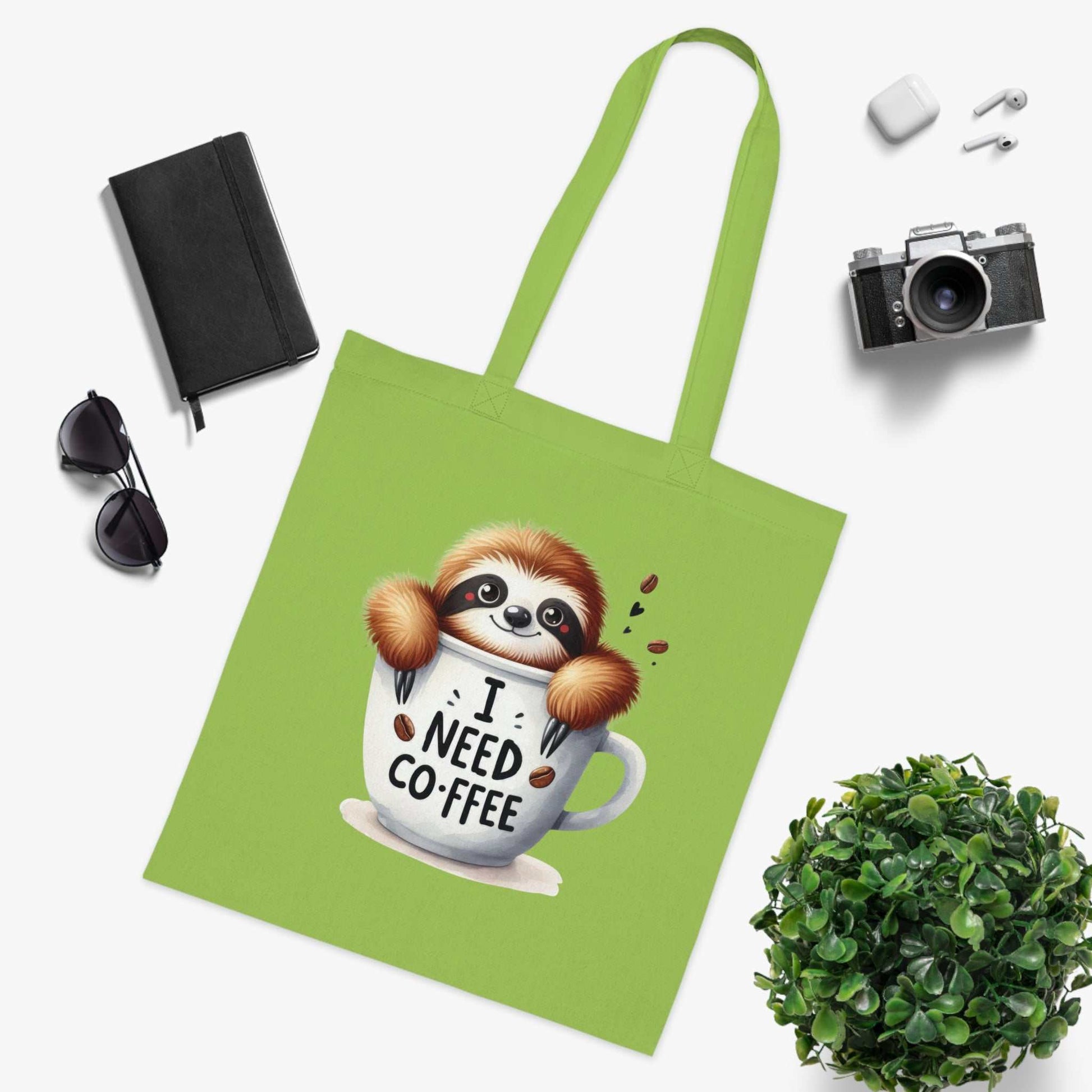 Cute sloth tote bag with vibrant design, 100% cotton, ideal for sloth lovers.