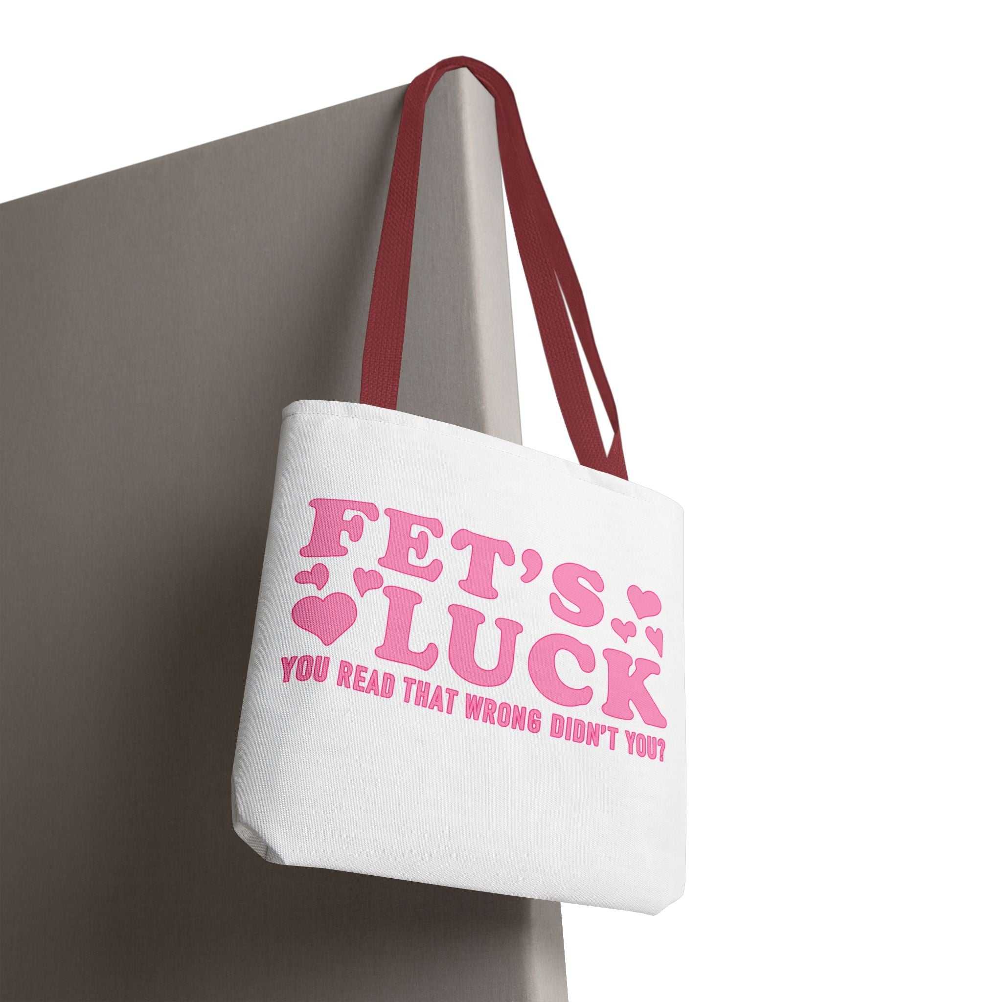 Pink heart tote bag with cheeky design and multiple handle color options