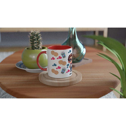 Personalised adorable Valentines Day mug with colorful design on a wooden table.