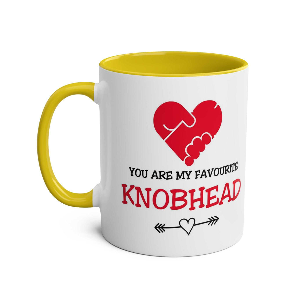 Favourite Knobhead Mug white ceramic mug with yellow handle and inside, heart handshake design and cheeky Valentine's Day message