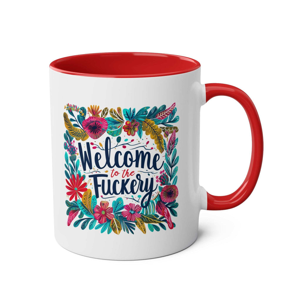 "Welcome To The Fuckery" coffee mug with floral design, red interior and handle.