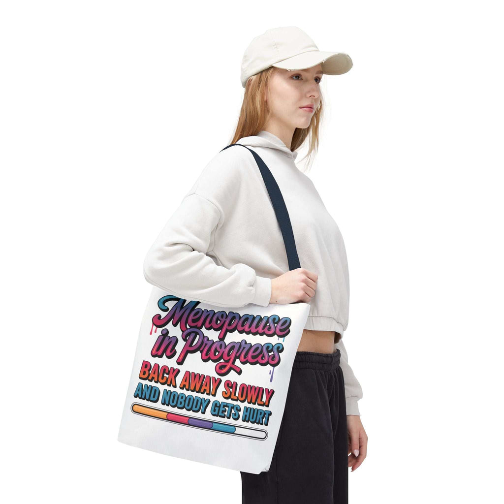 Menopause in Progress tote bag with cheeky design, durable polyester, multiple sizes and handle color options